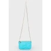 Blue leather bag with gold chain