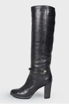 Tall black leather boots