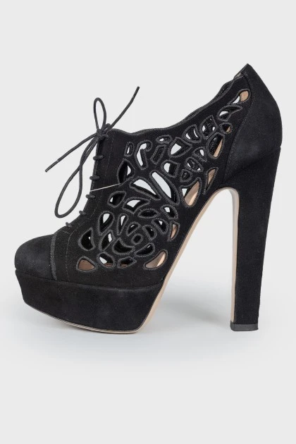 Black suede high-heeled ankle boots