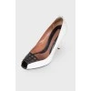 Leather white and black heeled shoes