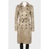 Golden coat with floral embroidery