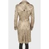 Golden coat with floral embroidery