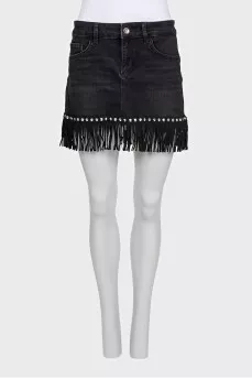 Black denim mini skirt decorated with fringe