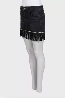 Black denim mini skirt decorated with fringe