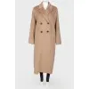 A woolen long coat with a tag