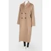 A woolen long coat with a tag