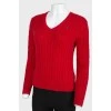 Red V-neck sweater