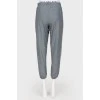 Gray sports trousers with tag