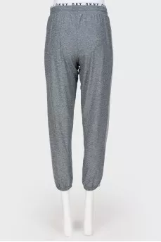 Gray sports trousers with tag