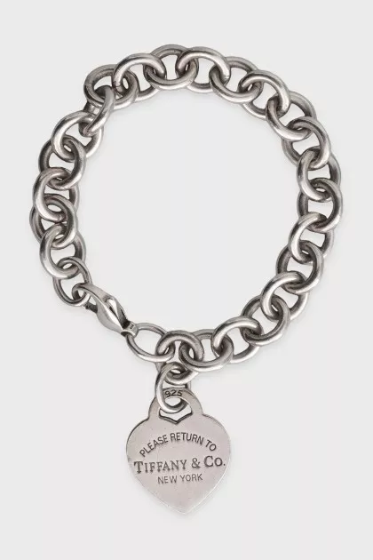 Silver link bracelet with signature charm