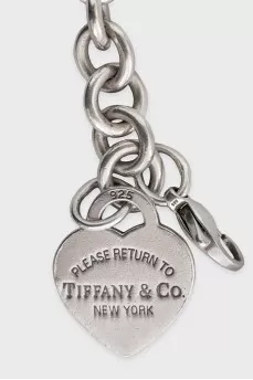 Silver link bracelet with signature charm