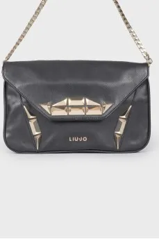 Leather bag with metal decor