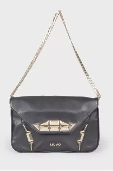 Leather bag with metal decor