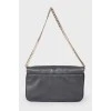 Leather bag with metal decor
