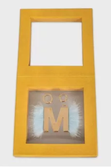 Golden pendant with decor