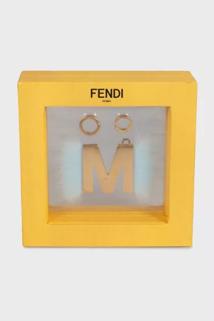 Golden pendant with decor