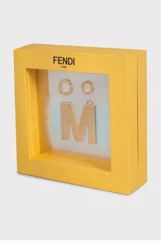Golden pendant with decor