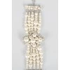 Pearl bracelet with a cross