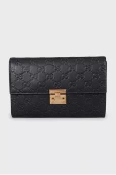Black leather clutch with embossing