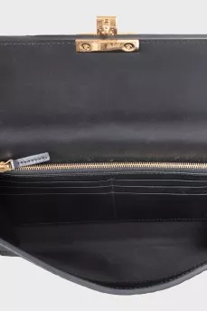 Black leather clutch with embossing
