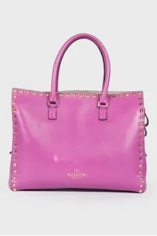 Purple spiked bag