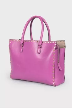 Purple spiked bag