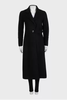 Fitted black coat with a belt