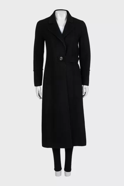Fitted black coat with a belt