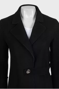 Fitted black coat with a belt