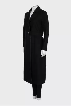 Fitted black coat with a belt