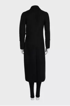 Fitted black coat with a belt