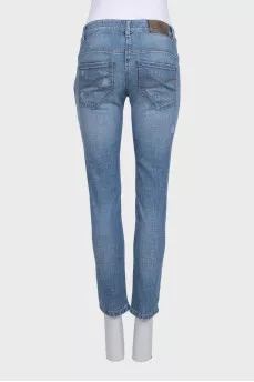 Голубые джинсы slim fit на низкой посадке с потёртостями