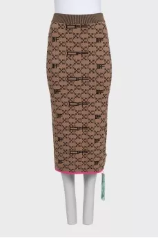 Brown skirt suit with branded print and tag