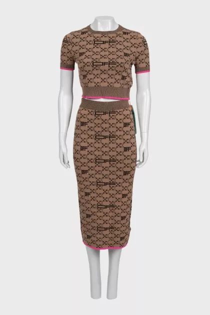 Brown skirt suit with branded print and tag