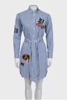 Striped shirt dress decorated with patches