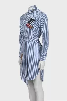 Striped shirt dress decorated with patches