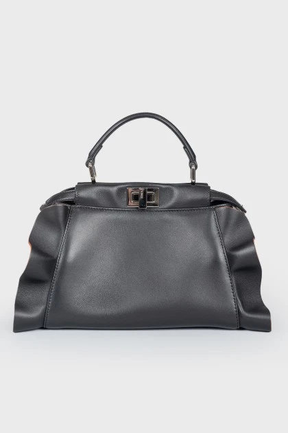 Leather bag with peekaboo frills