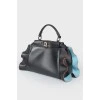 Leather bag with peekaboo frills