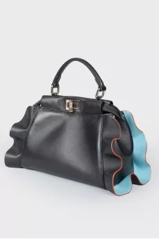 Leather bag with peekaboo frills