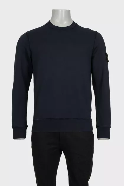 Men's blue sweatshirt with branded patch and tag