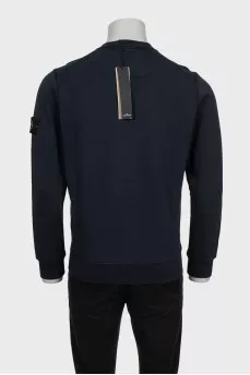 Men's blue sweatshirt with branded patch and tag