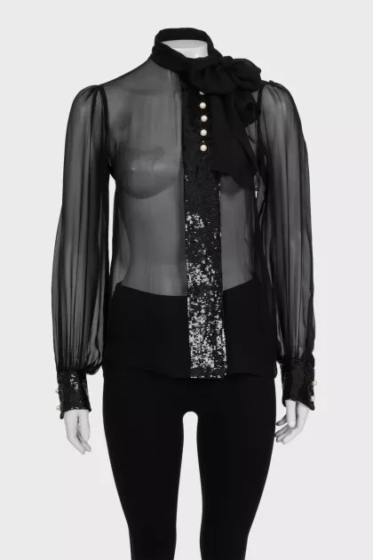 Transparent blouse decorated with sequins