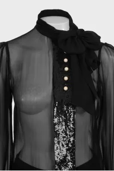 Transparent blouse decorated with sequins