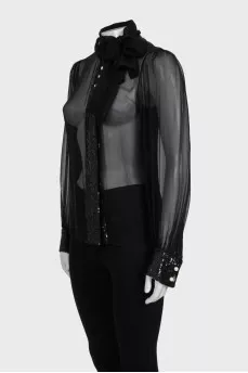 Transparent blouse decorated with sequins