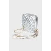 A quilted silver handbag