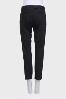 Tapered black wool trousers