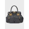 Black leather bag on handles