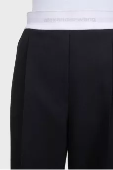 Черные широкие брюки с лого на резинке