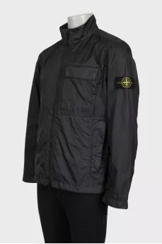 Men's black windbreaker with branded patch