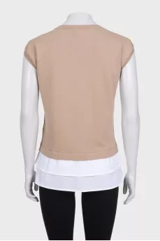 Beige sleeveless vest with accent hem